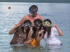 Snorkel-Ready – Group Posing for an Underwater Adventure